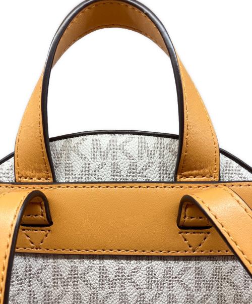 MICHAEL KORS（マイケルコース）MICHAEL KORS (マイケルコース) リュック イエローの古着・服飾アイテム