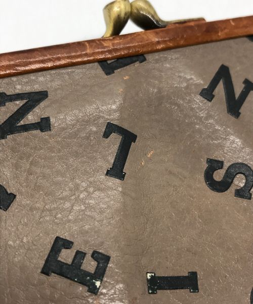 IL BISONTE（イル ビゾンテ）IL BISONTE (イル ビゾンテ) ランダムロゴレザーウォレットの古着・服飾アイテム