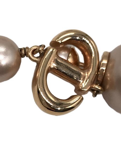 Dior（ディオール）DIOR (ディオール) トライバルピアス ゴールド×ライトピンクの古着・服飾アイテム