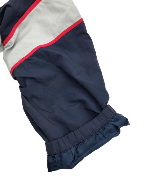 SUPREME（シュプリーム）Supreme (シュプリーム) GENUINE MERCHANDISE (ジェニュイン マーチャンダイズ) 21AW New York Yankees Track Pant グレー×ネイビー サイズ:Sの古着・服飾アイテム