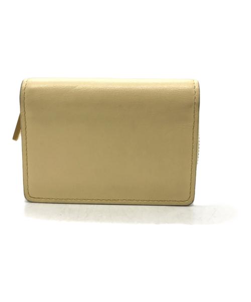 TOD'S（トッズ）TOD'S (トッズ) Tタイムレス2つ折り財布 イエローの古着・服飾アイテム