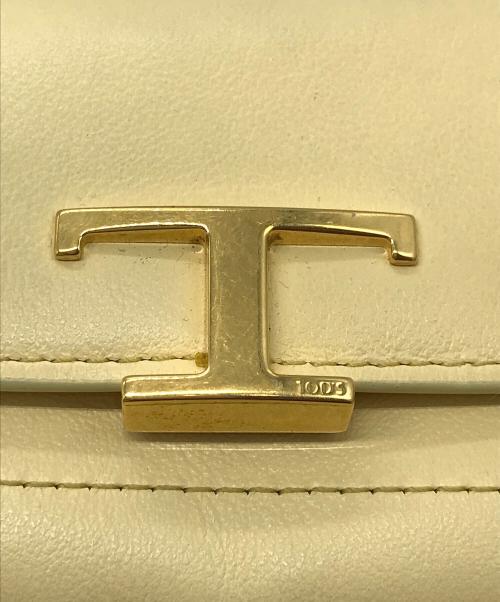 TOD'S（トッズ）TOD'S (トッズ) Tタイムレス2つ折り財布 イエローの古着・服飾アイテム