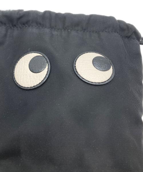 ANYA HINDMARCH（アニヤ・ハインドマーチ）ANYA HINDMARCH (アニヤハインドマーチ) アイズドローストリングポーチ ブラックの古着・服飾アイテム