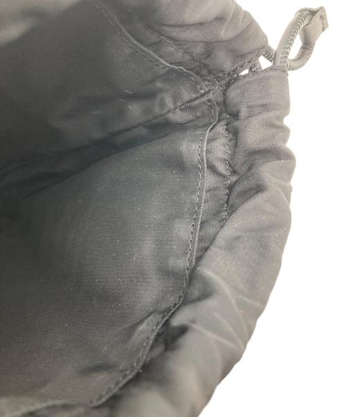 ANYA HINDMARCH（アニヤ・ハインドマーチ）ANYA HINDMARCH (アニヤハインドマーチ) アイズドローストリングポーチ ブラックの古着・服飾アイテム