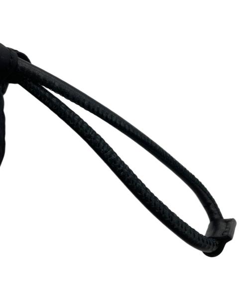 ANYA HINDMARCH（アニヤ・ハインドマーチ）ANYA HINDMARCH (アニヤハインドマーチ) アイズドローストリングポーチ ブラックの古着・服飾アイテム