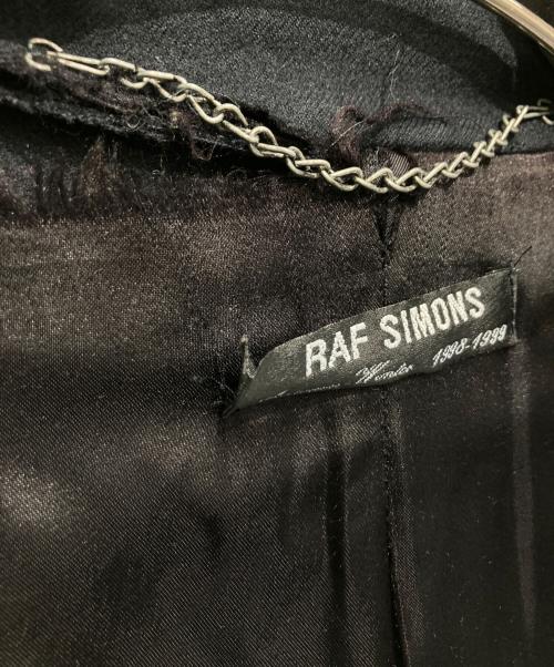 RAF SIMONS（ラフシモンズ）RAF SIMONS (ラフシモンズ) ウールロングコート/ステンカラーコート/archive/radioactivity期 ブラック サイズ:48の古着・服飾アイテム