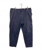 COMOLIコモリ）の古着「コットンネル テーパードパンツ」｜ネイビー