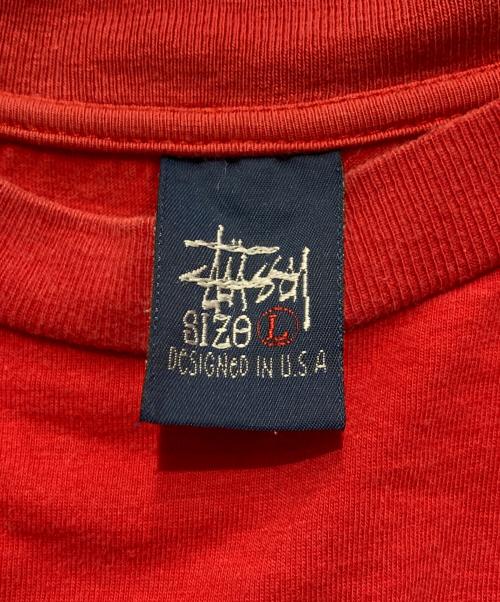 stussy（ステューシー）stussy (ステューシー) シャネルロゴプリントTシャツ レッド サイズ:Lの古着・服飾アイテム