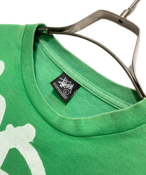 stussy（ステューシー）stussy (ステューシー) WORLD STUSSY WIDE プリントTシャツ グリーン サイズ:Lの古着・服飾アイテム