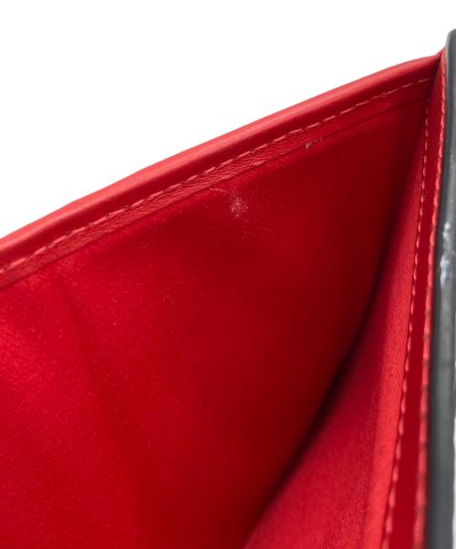 Christian Louboutin（クリスチャン・ルブタン）Christian Louboutin (クリスチャン・ルブタン) スタッズコンパクトウォレット ブラックの古着・服飾アイテム