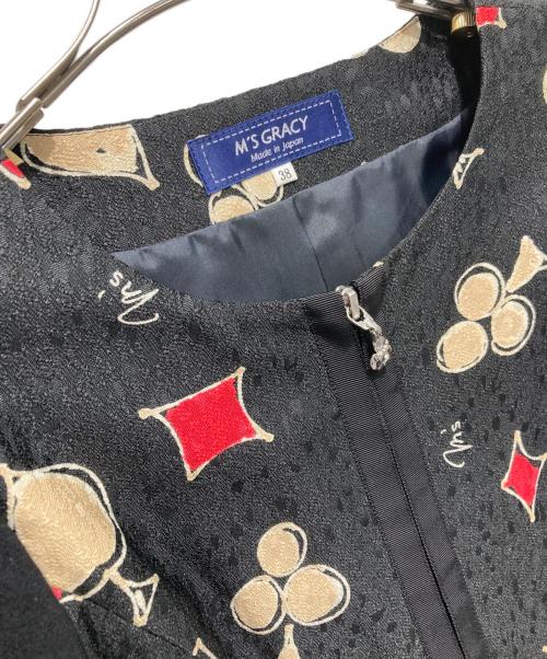 M'S GRACY（エムズグレイシー）M'S GRACY (エムズグレイシー) トランプモチーフ カメリアジップワンピース ブラック サイズ:38 未使用品の古着・服飾アイテム