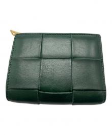 BOTTEGA VENETA（ボッテガベネタ）の古着「スモールカセット 2つ折り財布」｜グリーン