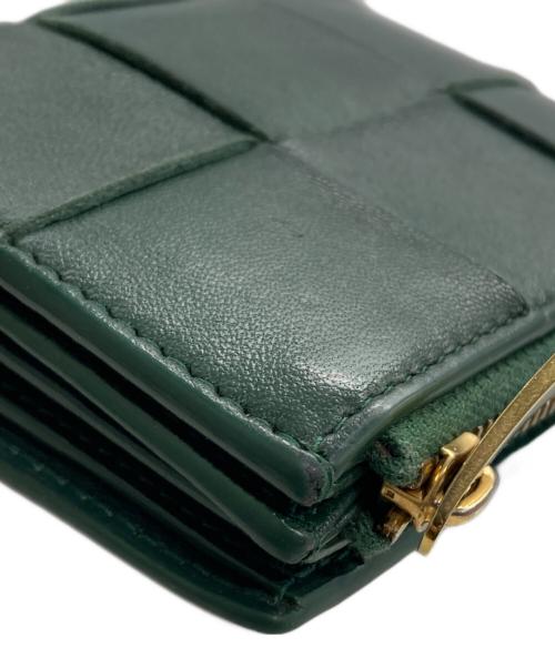 BOTTEGA VENETA（ボッテガベネタ）BOTTEGA VENETA (ボッテガベネタ) スモールカセット 2つ折り財布 グリーンの古着・服飾アイテム