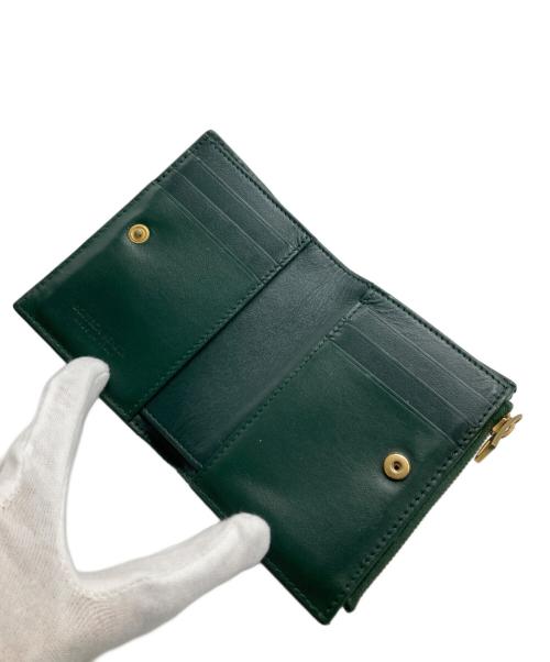 BOTTEGA VENETA（ボッテガベネタ）BOTTEGA VENETA (ボッテガベネタ) スモールカセット 2つ折り財布 グリーンの古着・服飾アイテム