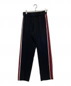 KENZOケンゾー）の古着「サイドライントラックパンツ」｜ブラック×レッド