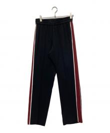 KENZO（ケンゾー）の古着「サイドライントラックパンツ」｜ブラック×レッド