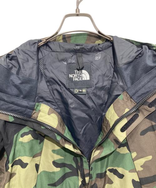 THE NORTH FACE（ザ ノース フェイス）THE NORTH FACE (ザ ノース フェイス) NOVELTY MOUNTAIN JACKET オリーブ サイズ:Mの古着・服飾アイテム