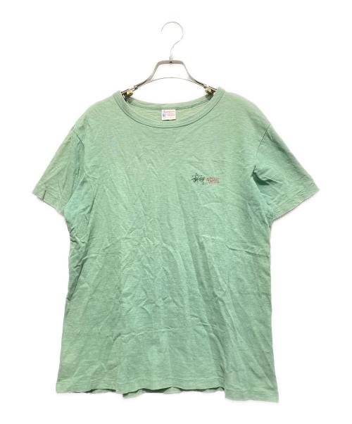 Champion（チャンピオン）Champion (チャンピオン) stussy (ステューシー) ツイストガール プリントTシャツ グリーン サイズ:Mの古着・服飾アイテム