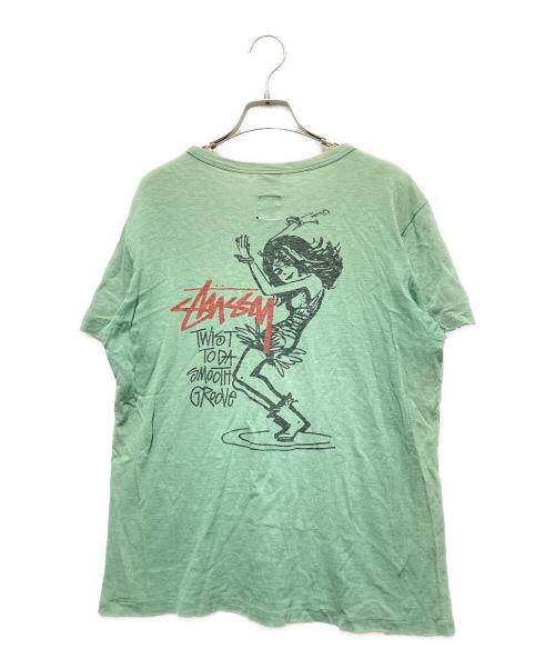 Champion（チャンピオン）Champion (チャンピオン) stussy (ステューシー) ツイストガール プリントTシャツ グリーン サイズ:Mの古着・服飾アイテム