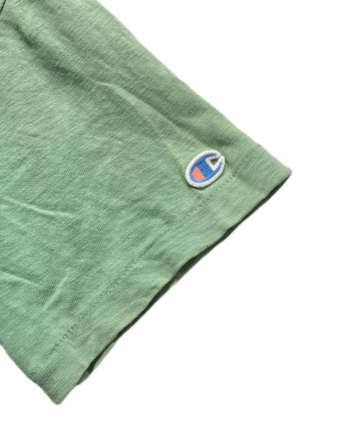 Champion（チャンピオン）Champion (チャンピオン) stussy (ステューシー) ツイストガール プリントTシャツ グリーン サイズ:Mの古着・服飾アイテム