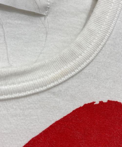 PLAY COMME des GARCONS（プレイコムデギャルソン）PLAY COMME des GARCONS (プレイコムデギャルソン) Printed Red Heart T-Shirt With Red Emblem White ネイビー サイズ:Mの古着・服飾アイテム