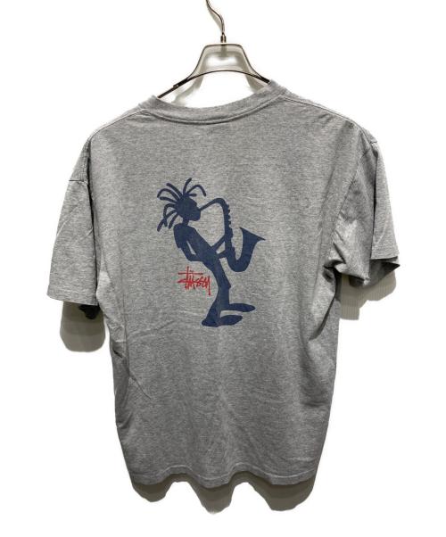 OLD STUSSY（オールドステューシー）OLD STUSSY (オールドステューシー) シャドーマンプリントTシャツ 紺タグ　90’S グレー サイズ:XLの古着・服飾アイテム