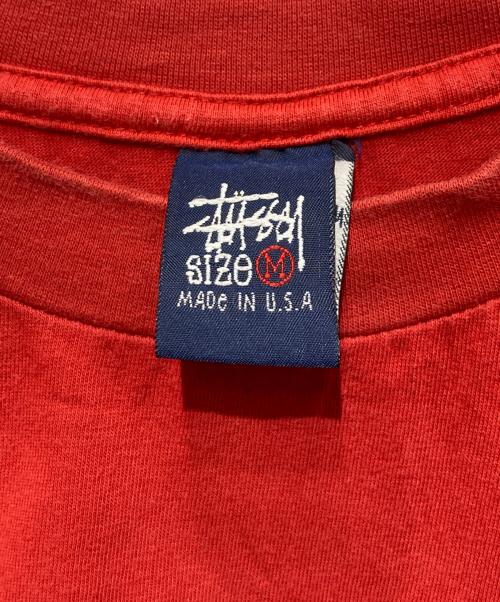 OLD STUSSY（オールドステューシー）OLD stussy (オールドステューシー) シャドーマンプリントTシャツ/紺タグ/90s/OLD STUSSY レッド サイズ:Mの古着・服飾アイテム
