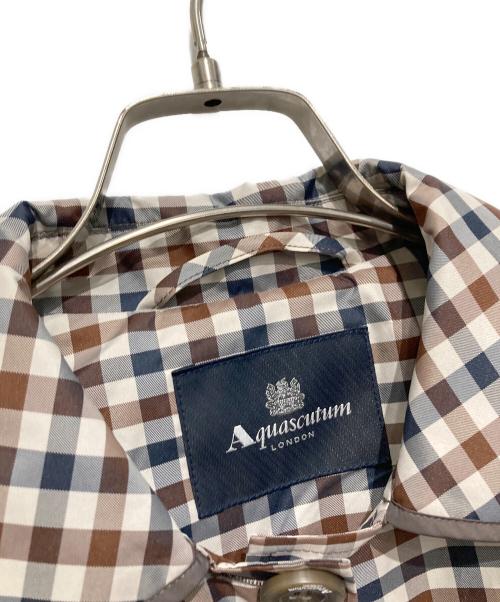 Aquascutum（アクアスキュータム）Aquascutum (アクアスキュータム) トレンチレインコート/チェックコート ベージュ×ブラウン サイズ:MLの古着・服飾アイテム