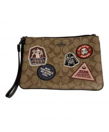 COACH×STAR WARS（コーチ×スターウォーズ）の古着「クラッチバッグ/STAR WARS コラボバッグ」｜ブラウン