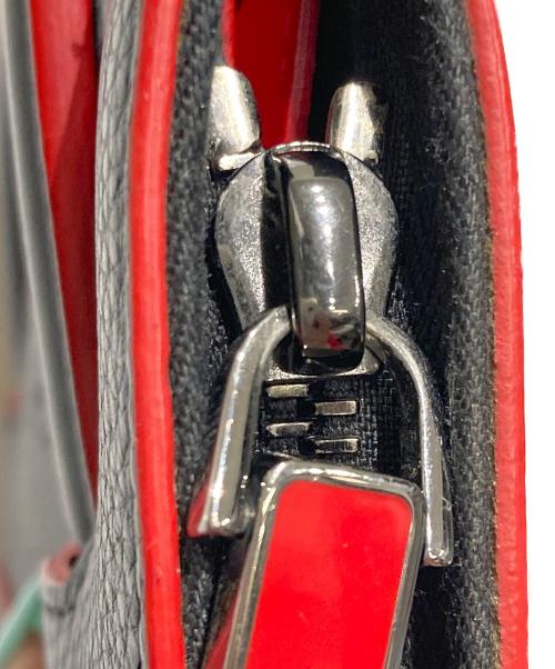 Christian Louboutin（クリスチャン・ルブタン）Christian Louboutin (クリスチャン・ルブタン) リックトラッククラッチバッグ ブラック×レッドの古着・服飾アイテム