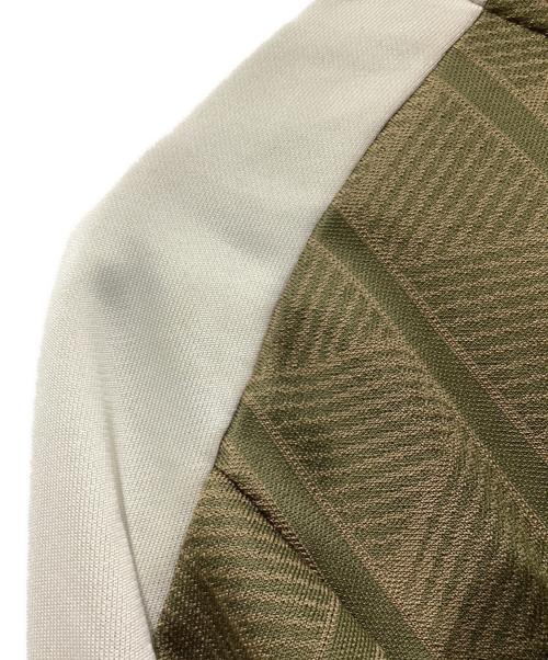 PUMA（プーマ）PUMA (プーマ) THE NEVERWORNII T7 トラックジャケット オリーブ サイズ:Mの古着・服飾アイテム