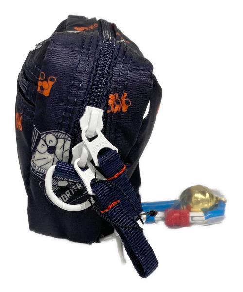 PORTER（ポーター）PORTER (ポーター) ドラえもん (ドラエモン) ポーチ ブラック 未使用品の古着・服飾アイテム