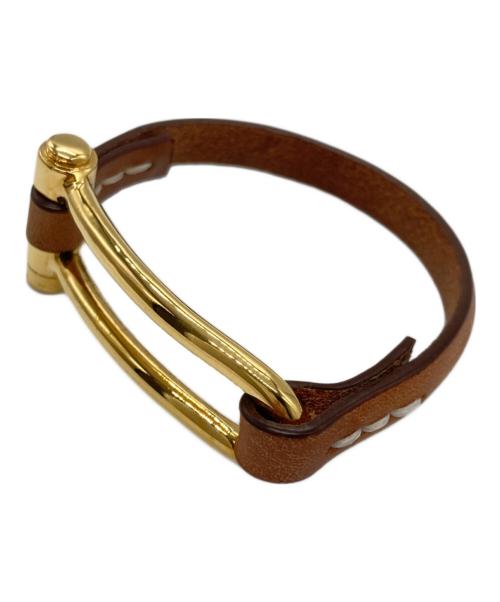 CXC（シーエックスシー）CXC (シーエックスシー) BUCKLE X LETHER ブレスレット ゴールド×ブラウンの古着・服飾アイテム