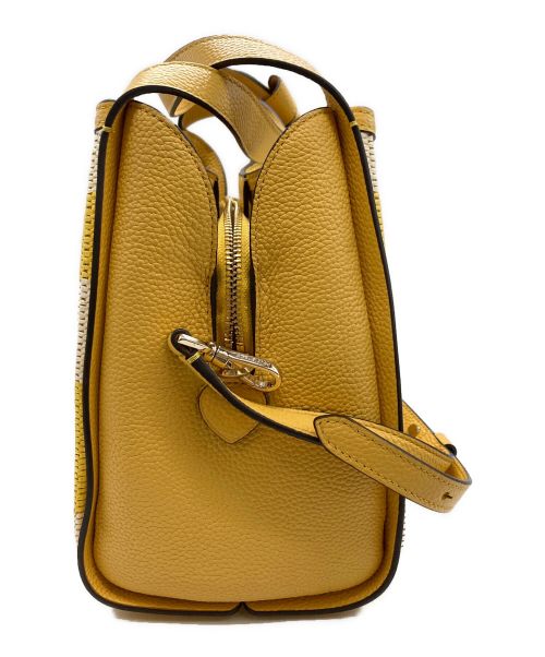 Kate Spade（ケイトスペード）Kate Spade (ケイトスペード) 2WAYショルダーバッグ イエロー×ホワイトの古着・服飾アイテム