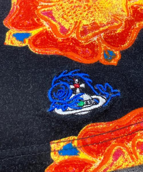 Vivienne Westwood ocean（ヴィヴィアンウエストウッドオーシャン）Vivienne Westwood ocean (ヴィヴィアンウエストウッドオーシャン) プリントTシャツ/ヴィヴィアンウエストウッドオーシャン ブラック×オレンジ サイズ:表記なしの古着・服飾アイテム