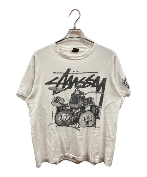 stussy（ステューシー）stussy (ステューシー) スカルバンドドラムTシャツ/ステューシー ホワイト サイズ:XLの古着・服飾アイテム