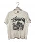 stussy（ステューシー）の古着「スカルバンドドラムTシャツ/ステューシー」｜ホワイト