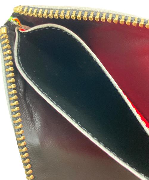 COMME des GARCONS（コムデギャルソン）COMME des GARCONS (コムデギャルソン) 2つ折り財布 オレンジ×イエローの古着・服飾アイテム