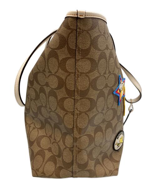 COACH（コーチ）COACH (コーチ) PEANUTS (ピーナッツ) コーティングキャンバスシグネチャートートバッグ ブラウン×ホワイトの古着・服飾アイテム