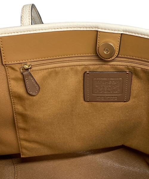 COACH（コーチ）COACH (コーチ) PEANUTS (ピーナッツ) コーティングキャンバスシグネチャートートバッグ ブラウン×ホワイトの古着・服飾アイテム