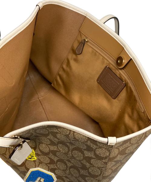 COACH（コーチ）COACH (コーチ) PEANUTS (ピーナッツ) コーティングキャンバスシグネチャートートバッグ ブラウン×ホワイトの古着・服飾アイテム