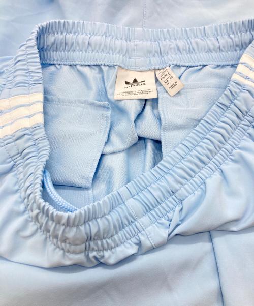 adidas（アディダス）adidas (アディダス) WOVEN TRACK PANTS スカイブルー サイズ:Lの古着・服飾アイテム