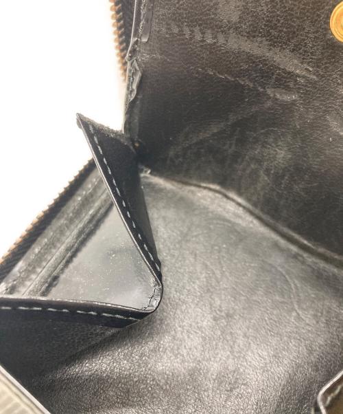 COMME des GARCONS（コムデギャルソン）COMME des GARCONS (コムデギャルソン) POLKA DOTS EMBOSSED WALLET ブラックの古着・服飾アイテム