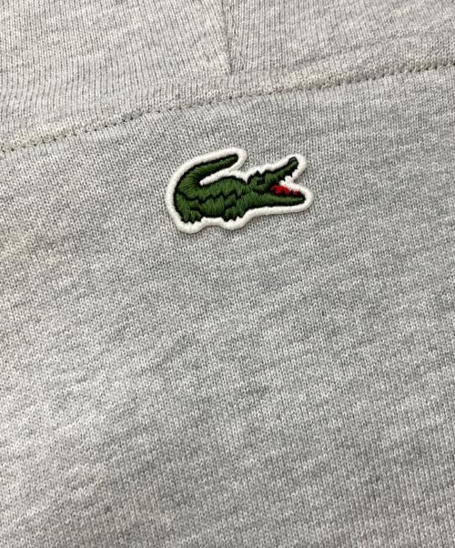 LACOSTE（ラコステ）LACOSTE (ラコステ) モノグラムレイヤードオーバルロゴスウェットフーディー グレー サイズ:3の古着・服飾アイテム