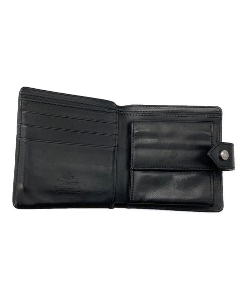 Vivienne Westwood（ヴィヴィアンウエストウッド）Vivienne Westwood (ヴィヴィアンウエストウッド) オーブ型押し2つ折り財布 ブラックの古着・服飾アイテム