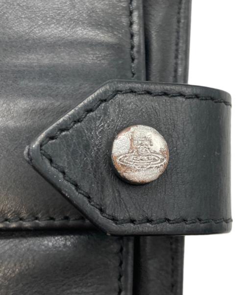 Vivienne Westwood（ヴィヴィアンウエストウッド）Vivienne Westwood (ヴィヴィアンウエストウッド) オーブ型押し2つ折り財布 ブラックの古着・服飾アイテム