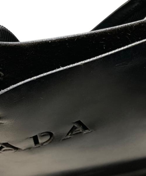 PRADA（プラダ）PRADA (プラダ) ロゴ型抜きレザートートバッグ ブラックの古着・服飾アイテム