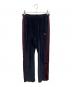 Needles（ニードルズ）の古着「トラックパンツ」｜ネイビー