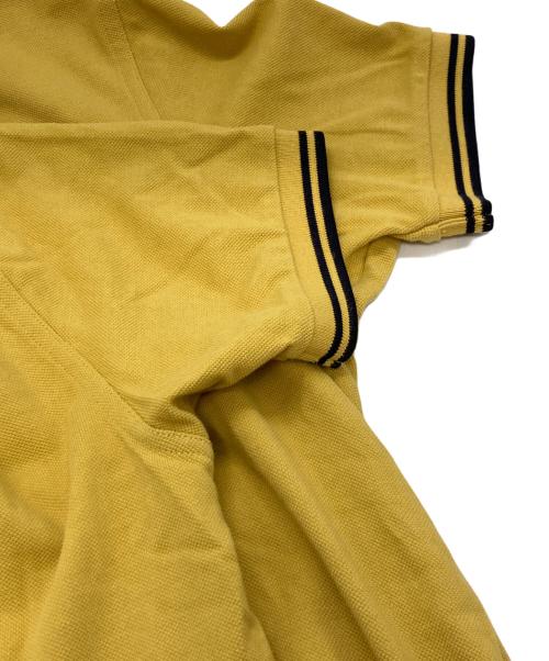 FRED PERRY（フレッドペリー）FRED PERRY (フレッドペリー) ポロシャツ イエロー サイズ:Sの古着・服飾アイテム