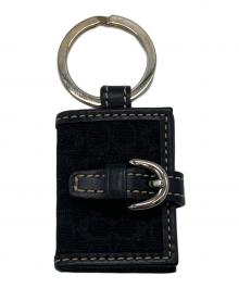 COACH（コーチ）の古着「手帳型チャーム」｜ブラック